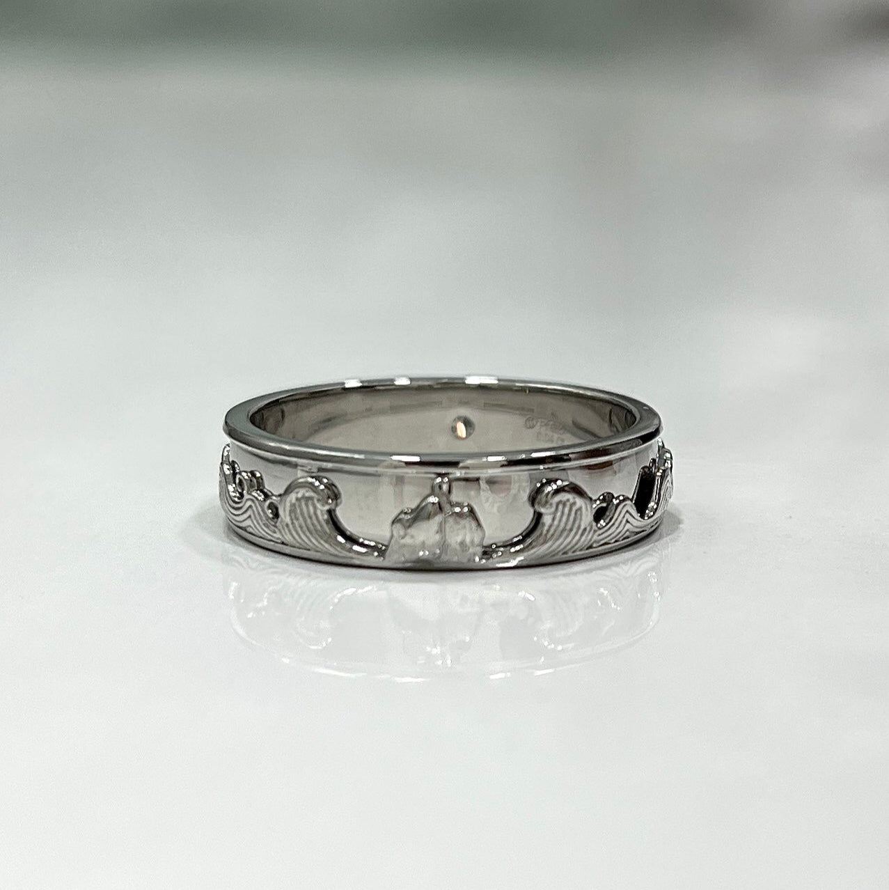 Ocean Wave Platinum Band with Hidden Elements